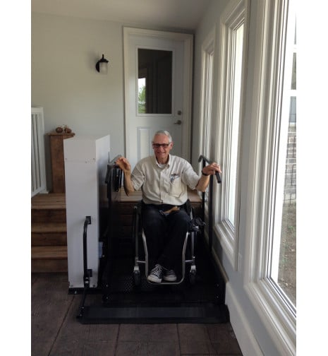 happy customer on his Freedom Wheelchair lift