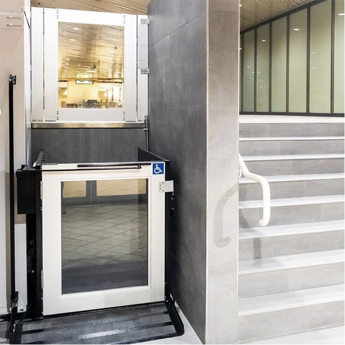 commercial platform lift with glass in doors